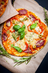 Delicious fresh pizza on dark