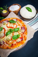 Delicious fresh pizza on dark