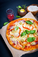 Delicious fresh pizza on dark