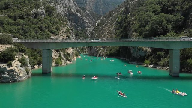 Aerial - Flyover famous bridge at Gorges du Verdon and into the valley