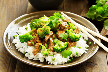 Beef with broccoli and rice. Asian cuisine.