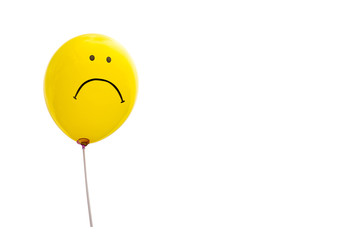 yellow balloon, feel bad and sad in Blue Sky background. sign of emotion. image for background, wallpaper. copy space - Powered by Adobe