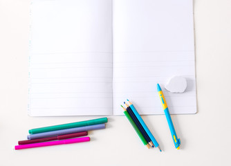 pencils markers stationery for schooling on the table