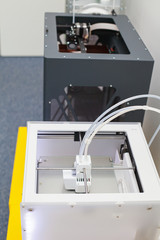 White three-dimensional printer