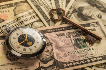 Pocket Watch and Key on Banknotes