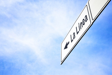 Signboard pointing towards La Linea
