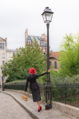 Montmartre, beautiful girl with retro clothes walking in Montmartre
