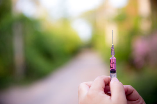 syringe contained grud liquid , prepare to injection. image for background, wallpaper, copy space. healthy and medical concept.