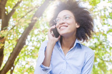 Beautiful Young Black Woman Speaking By Phone