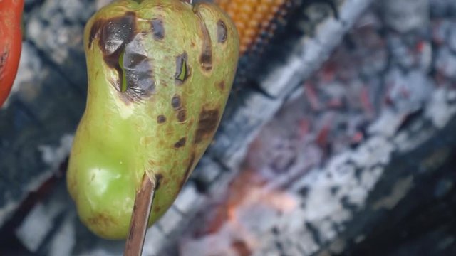 cooking pepper on fire