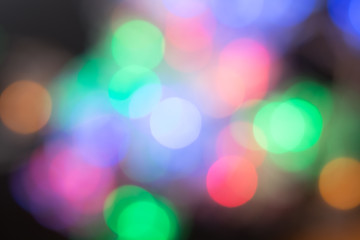 Christmas abstract. City night light blur bokeh, defocused background.