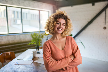 Portrait of confident creative businesswoman in office


