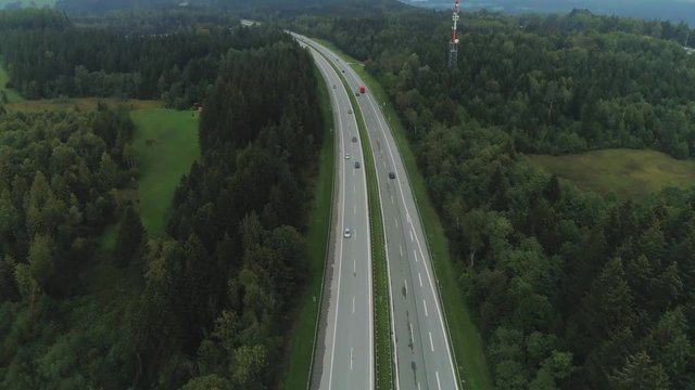 Cars on the Autobahn in Germany fast driving beautiful road