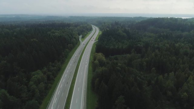 Cars on the Autobahn in Germany fast driving beautiful road