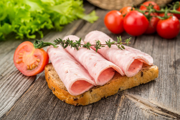 sandwich with ham and vegetables. Organic products