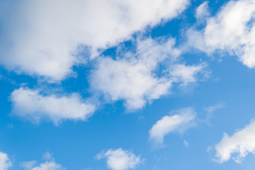 Obraz premium White clouds on a blue sky