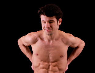portrait of muscular man, backache