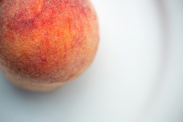 close up peach fruits show hair on the surface peeling, macro for details.image for background and wallpaper