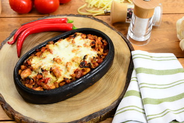 pizza with tomatoes and cheese