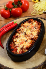 pizza with tomatoes and olives