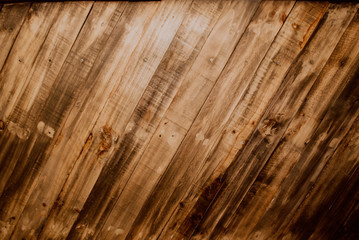 Obraz premium Old wood reclaimed plank texture background. Diagonal flat boards with beautiful natural pattern. Old grunge dark textured wall. Close up of wall made of wooden planks