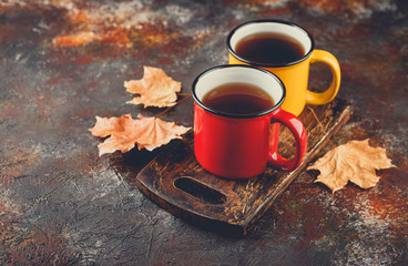 Enameled cup of hot tea