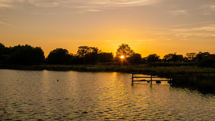 Sunset over Pen y fan pond