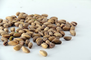 pile of pumpkin seeds isolated on white background