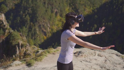 girl in vr glasses surprised standing on the edge