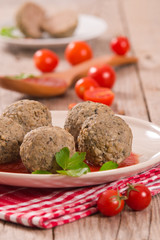 Meatballs with tomato sauce.