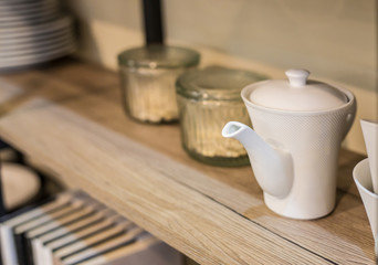 Kitchen wooden shelf with minimalistic utensil