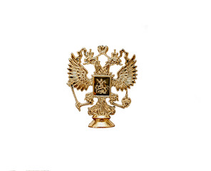 Cast bronze Russian coat of arms isolated on a white background. Russian State Emblem - a double...