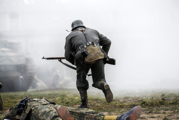 Historical reenactment of soldiers during the Second World War, view from the back