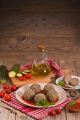 Meatballs with tomato sauce.