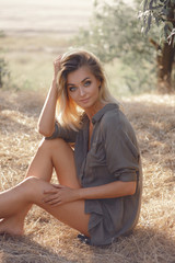 Fototapeta premium girl at sunset wearing a hackey shirt