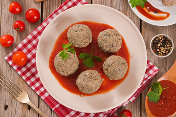 Meatballs with tomato sauce.