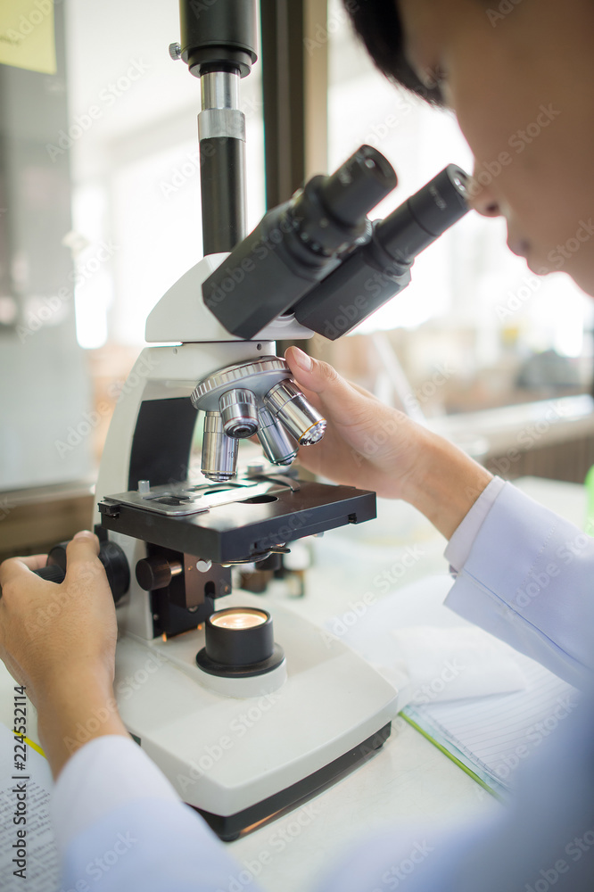 Poster microscope in laboratory