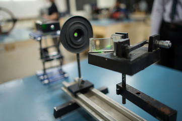 Fototapeta na wymiar laser beam experiment tool in the science laboratory
