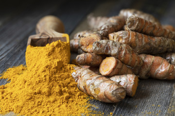 Scoop of Turmeric with Roots