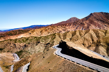 Atlas mountain range from Morocco. Road serpentine in the mountains. Chain of mountain ranges in...