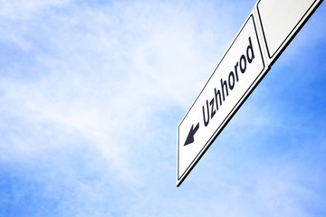 Signboard pointing towards Uzhhorod