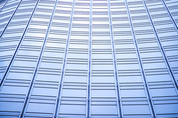 underside panoramic and perspective view to steel blue glass high rise building skyscrapers, business concept of successful industrial architecture