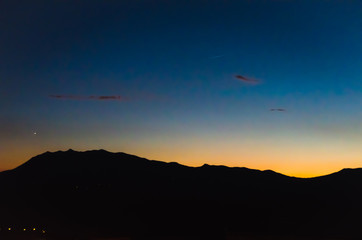 Amazing sunset with mountain silhouette