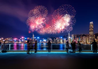 Fototapeten Firework show  in Hong Kong Victoria Harbor © YiuCheung