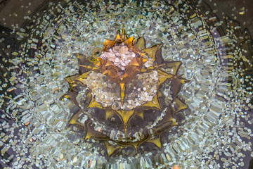Coins thrown to a fountain