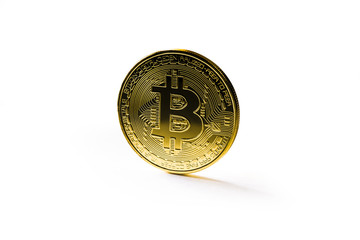 Golden Bitcoin coin on white background. Cryptocurrency.