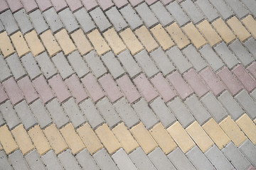 Brick pavement tile, top view. Urban texture as background.