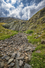 amazing mountain view of a river made of stones