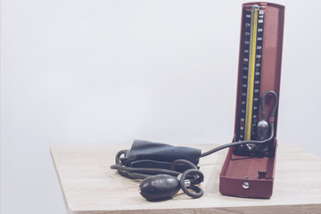 A blood pressure cuff called a sphygmomanometer used to check blood pressure