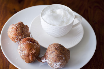 Morning cappucino with delicious muffins